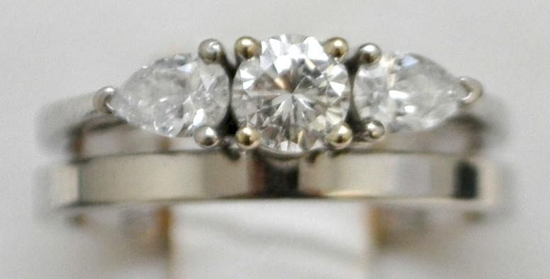 Appraisal: STONE DIAMOND ENGAGEMENT RING WEDDING BANDS A Lady's Stone Diamond