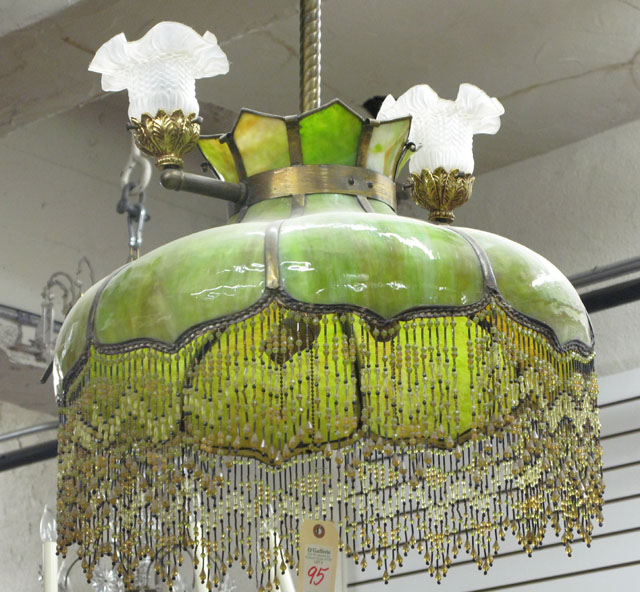 Appraisal: HANGING BENT-GLASS PANEL LIGHT SHADE WITH BEAD FRINGE attributed to