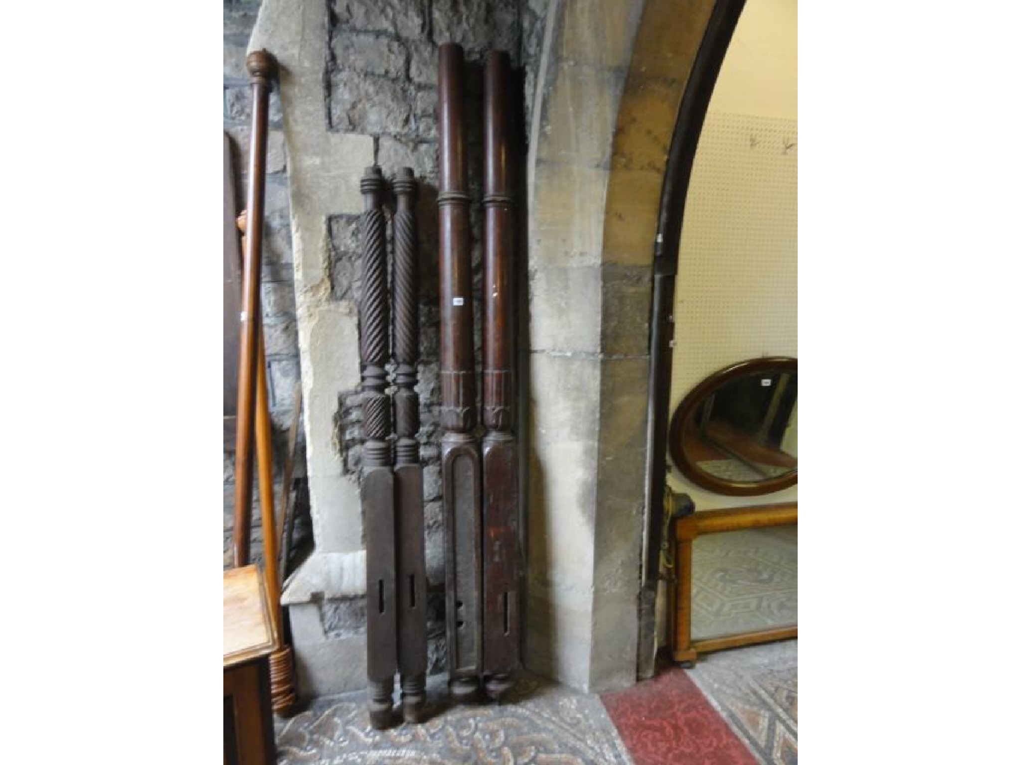 Appraisal: A pair of th century mahogany four poster bed posts