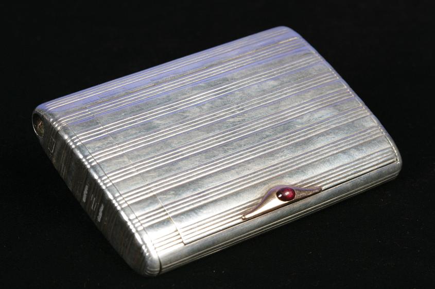 Appraisal: FABERGE A RUSSIAN SILVER CIGARETTE CASE of oval section with