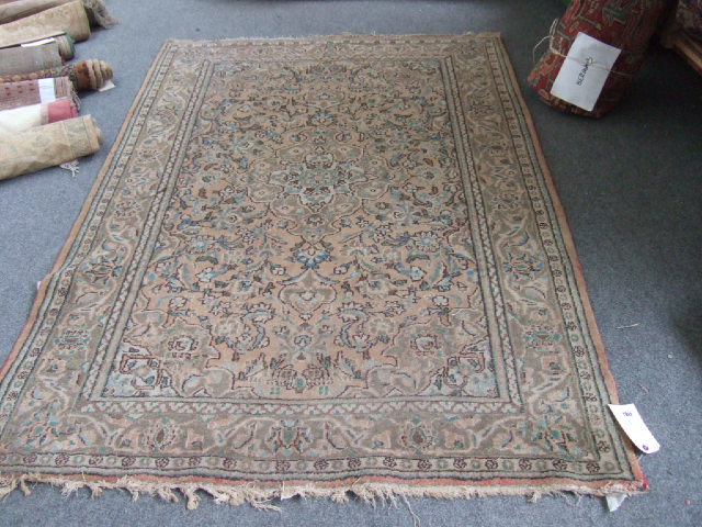 Appraisal: A Sarough rug Persian the pale madder field with sage