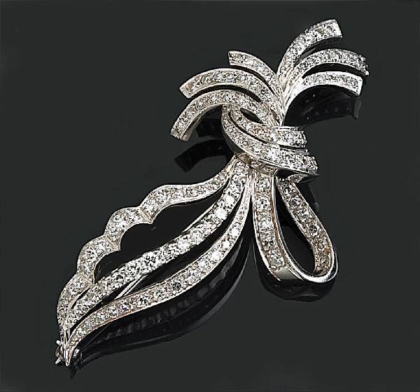 Appraisal: A diamond and k white gold ribbon brooch estimated total