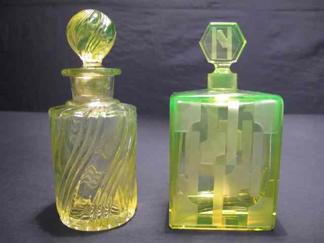 Appraisal: The first an Art Deco rectangular bottle with engraved geometric