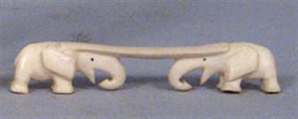 Appraisal: Carved ivory figural knife rest with elephants