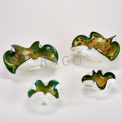 Appraisal: MURANO Four biomorphic green and white bowls with aventurine and