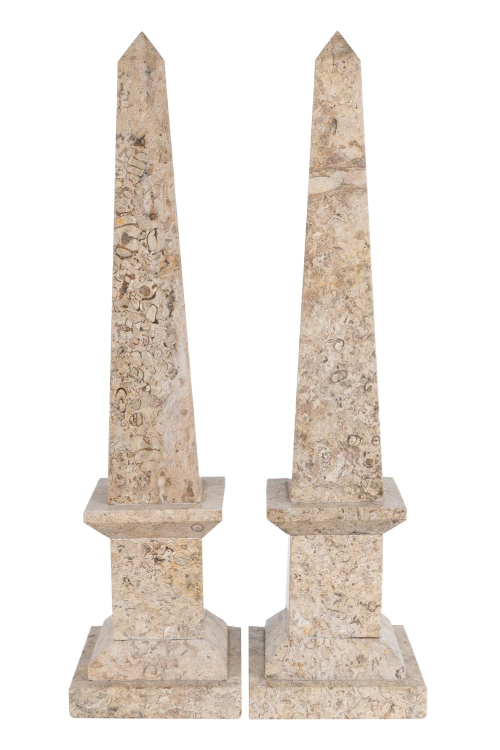 Appraisal: PAIR OF STONE OBELISKSeach affixed to square plinth Condition chips