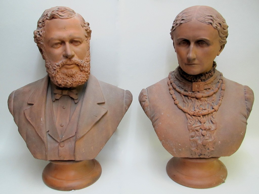 Appraisal: A pair of th Century terracotta portrait busts of Mr