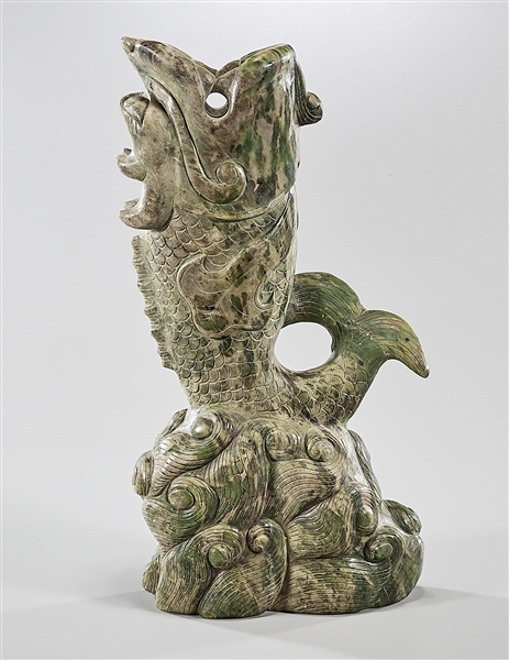 Appraisal: Chinese carved hardstone dragon headed fish x x approx Condition