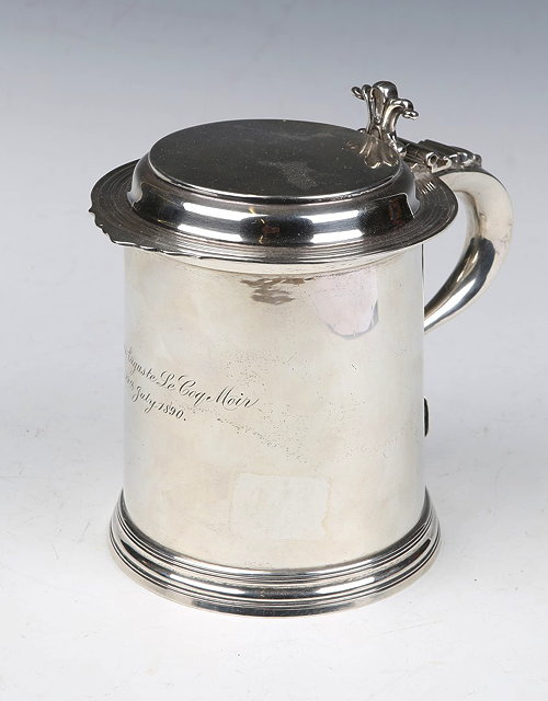 Appraisal: A SILVER LIDDED TANKARD with plain tapering form with turned