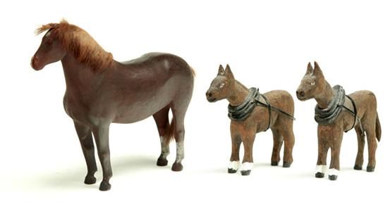 Appraisal: THREE CARVED HORSES American late th-mid th century softwood Horse