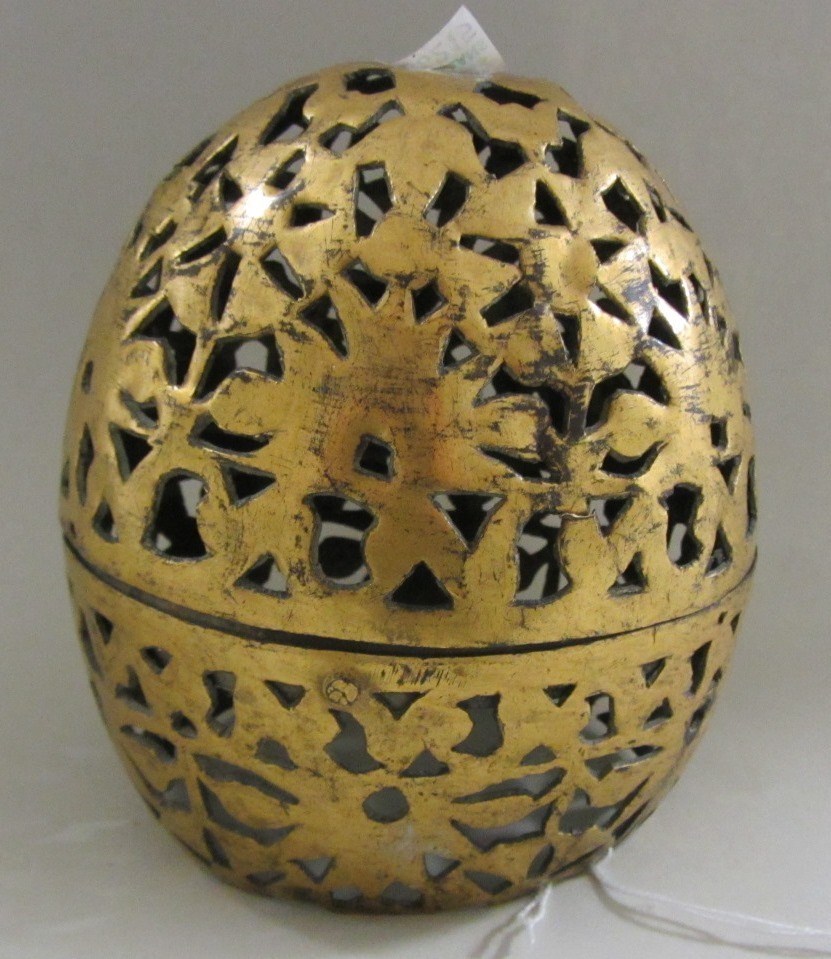 Appraisal: A pierced gilt-copper tombak element Ottoman Turky th century or