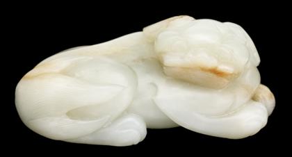 Appraisal: Chinese white jade lion Qing dynasty