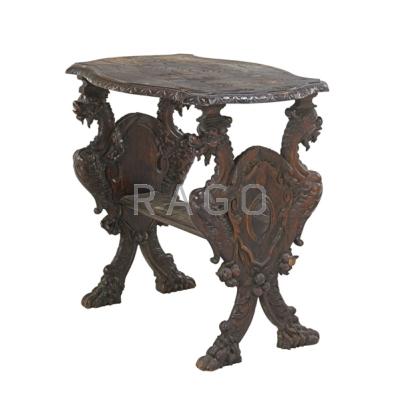 Appraisal: CONTINENTAL LIBRARY TABLE Walnut with elaborate carved griffins th c