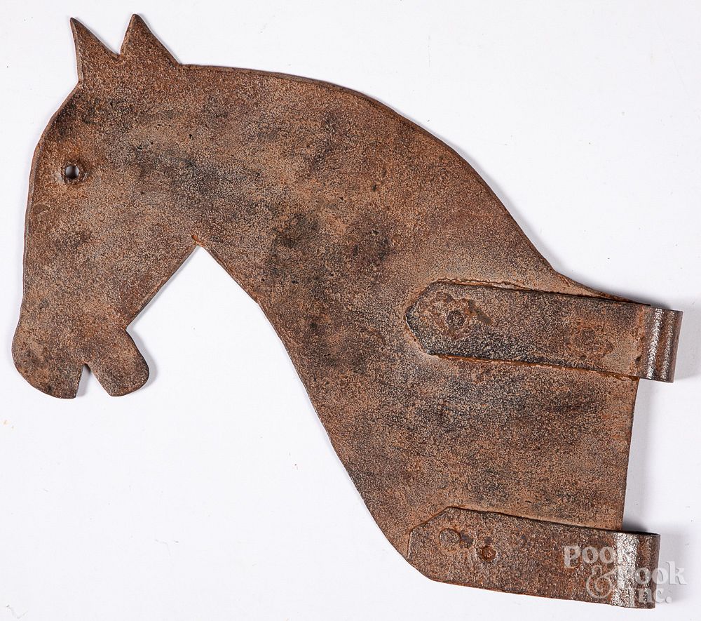 Appraisal: Sheet iron figural horse head hinge Sheet iron figural horse