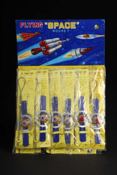 Appraisal: Flying Space Toys on Display Card Description Japanese Circa s