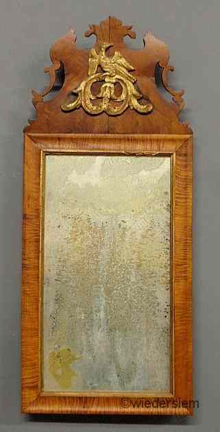 Appraisal: Continental curly walnut mirror th c with a carved crest