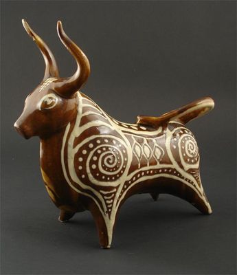 Appraisal: A William Newland earthenware bull slip trailed with geometric patterning