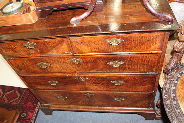 Appraisal: AN TH CENTURY WALNUT CHEST of two short and three