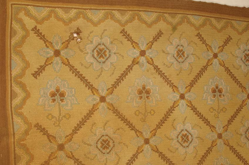 Appraisal: A CONTINENTAL SMALL CARPET the pale lemon ground worked with