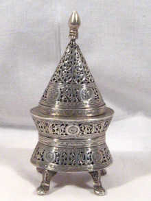 Appraisal: An Islamic silver pastille burner cm high