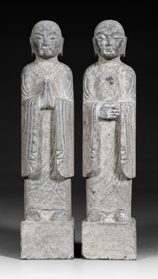 Appraisal: Pair Chinese stone lohans carved figures standing on rectangular bases