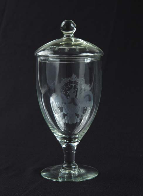 Appraisal: ENGRAVED CRYSTAL COVERED VASE Delicately blown vase has engraved spread