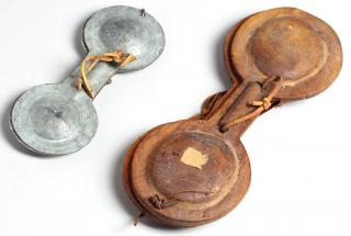 Appraisal: Moroccan Hand Clapper Instruments The larger of wood the smaller