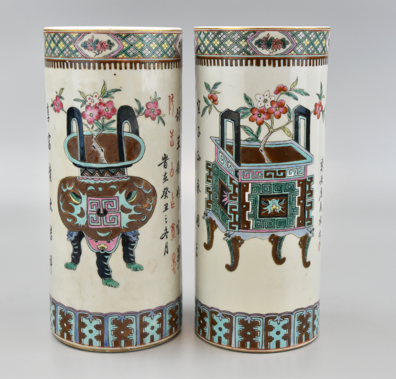 Appraisal: Pair of Chinese Republic period hat stands in cylinder form