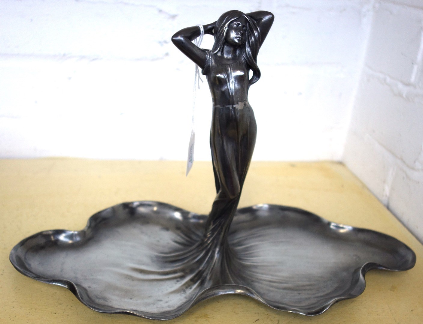 Appraisal: A WMF silvered metal figural dish circa modelled as an