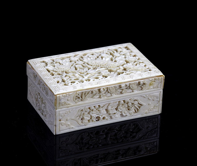 Appraisal: A Japanese ivory rectangular boxMeiji period - carved with flowers