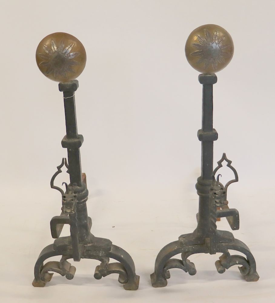 Appraisal: A Very Large Pair Of Hand Wrought Iron Andirons Decorated