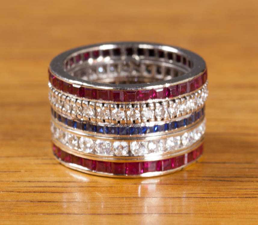 Appraisal: RUBY SAPPHIRE AND DIAMOND ETERNITY RING The mm wide k