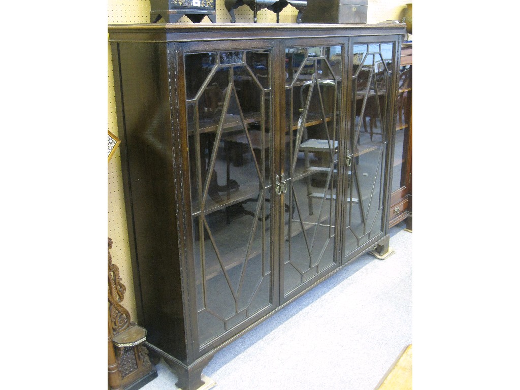 Appraisal: Oak three door astragal glazed bookcase