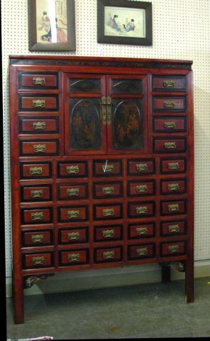 Appraisal: Painted red Chinese apothecary cabinet with drawers and door cabinet