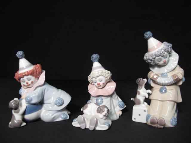 Appraisal: Three Lladro porcelain clowns each with a puppy figure Pierrot