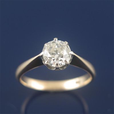 Appraisal: A diamond solitaire ring the old circular cut diamond weighs