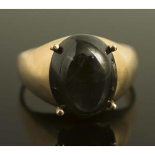 Appraisal: Black Star Sapphire Ring k gold ring containing a ct