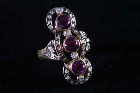 Appraisal: TH CENTURY SILVER-ON-YELLOW GOLD AMETHYST AND DIAMOND RING Row of