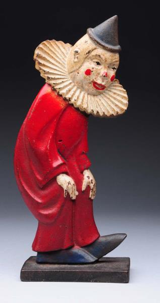 Appraisal: Cast Iron Clown Doorstop Double-sided casting with clown bent over