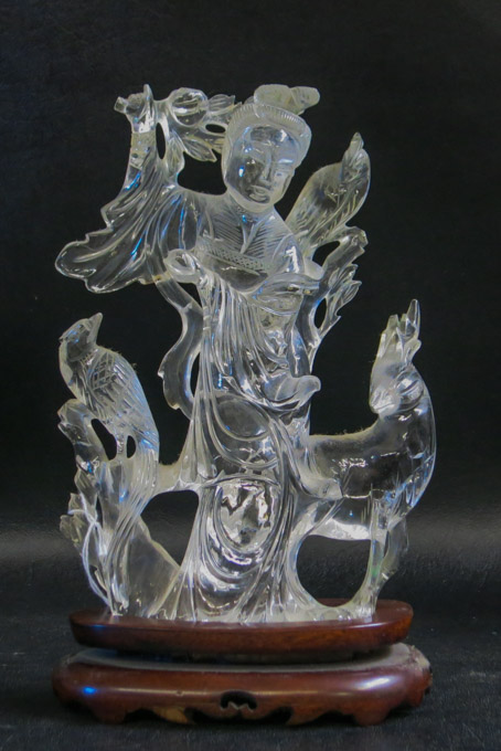 Appraisal: CHINESE CARVED ROCK CRYSTAL FIGURAL GROUP depicting a standing figure