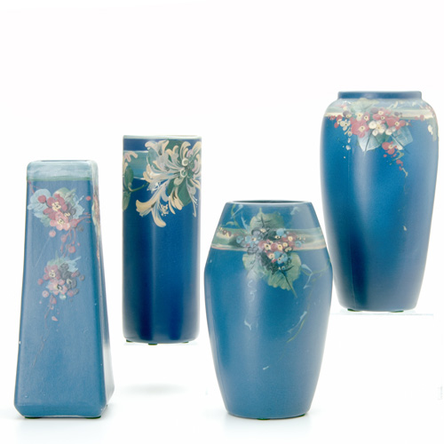 Appraisal: WELLLER Four Blue and Decorated Hudson vases each decorated with