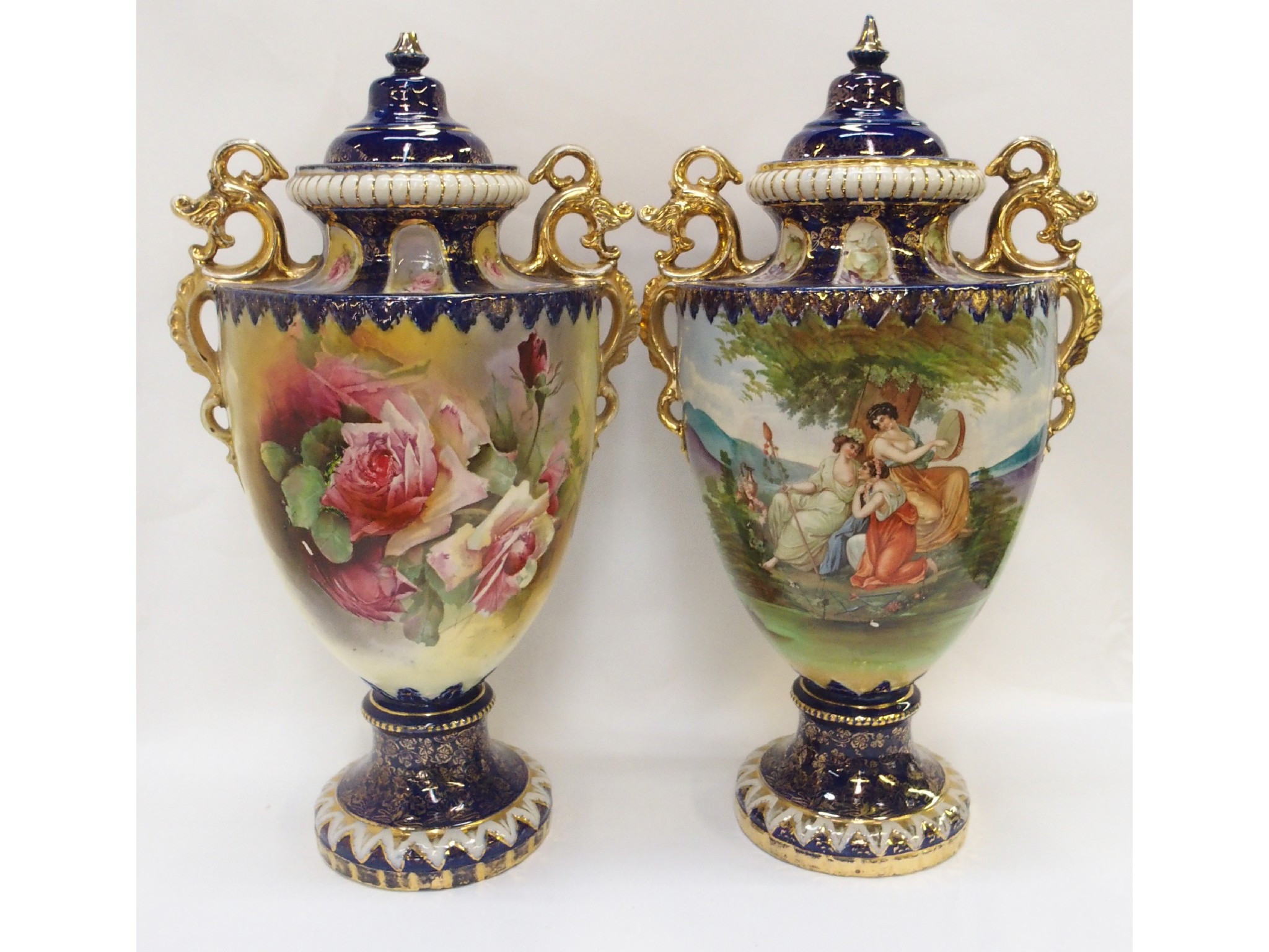 Appraisal: Pair of Continental painted and parcel gilt porcelain covered urns