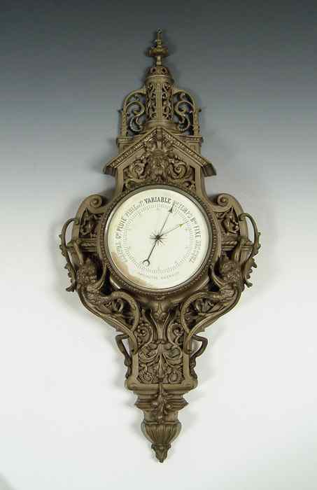 Appraisal: TH CENTURY FRENCH ANEROID BAROMETER Elaborately ornate cartel case ''h