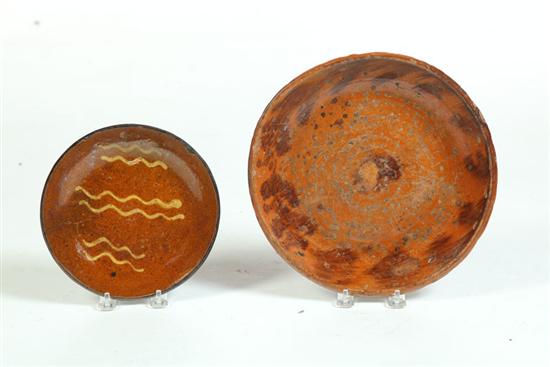 Appraisal: TWO REDWARE PIE PLATES American th century One has yellow