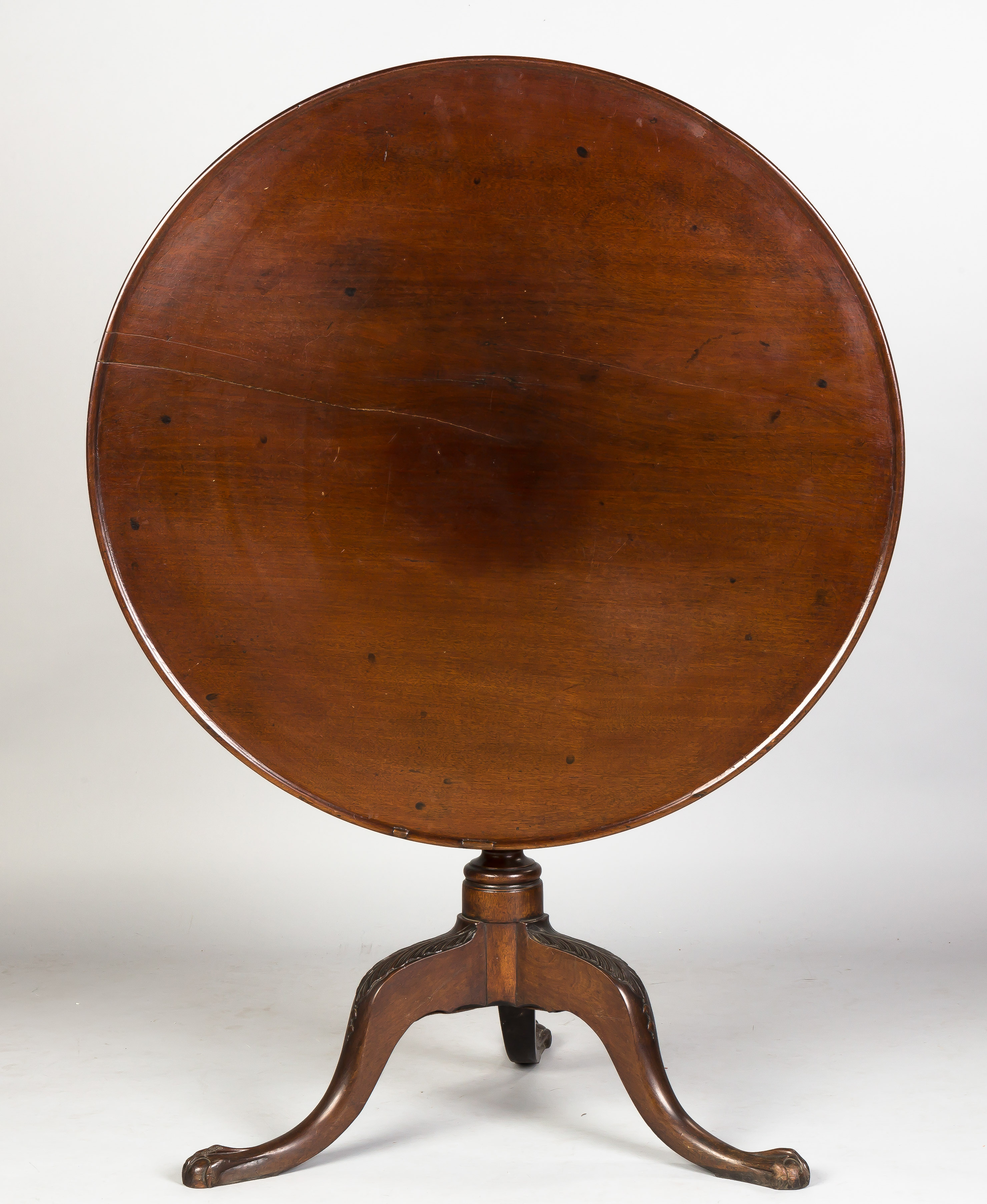 Appraisal: Chippendale Tilt-Top Table Walnut Claw and ball feet carved knees