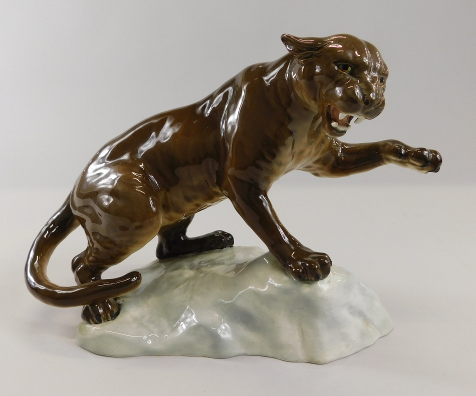 Appraisal: A Beswick model of a panther on a rock cm