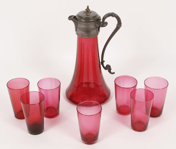 Appraisal: Eight piece cranberry glass drink set pitcher with Art Nouveau