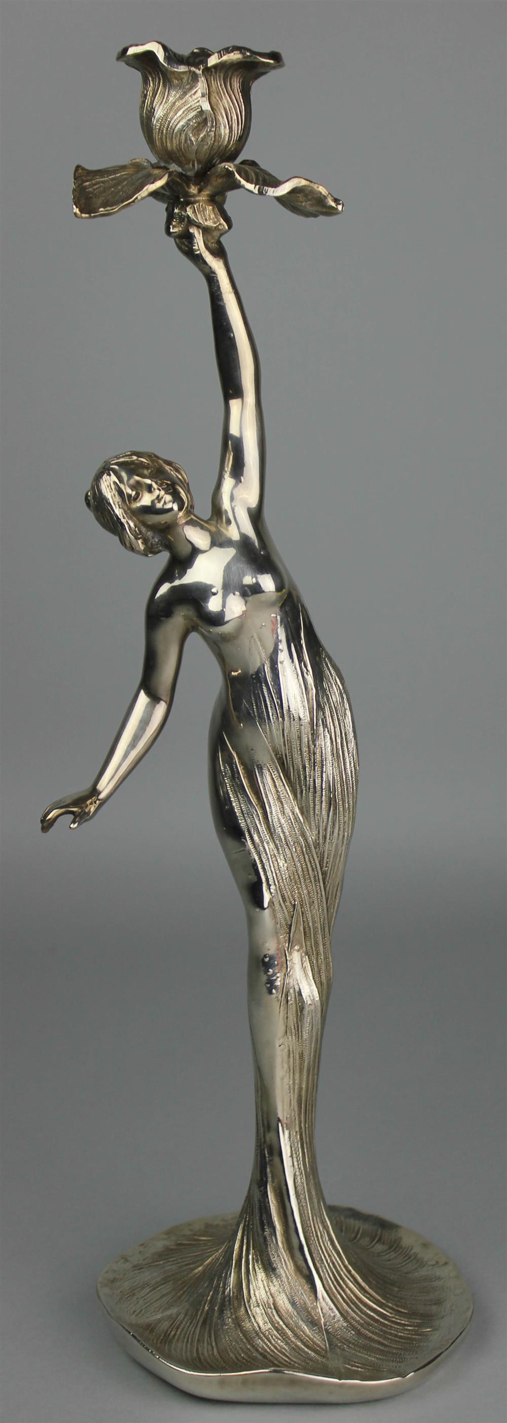 Appraisal: CONTINENTAL ART NOUVEAU STYLE SILVERED METAL FIGURAL CANDLESTICK th Century