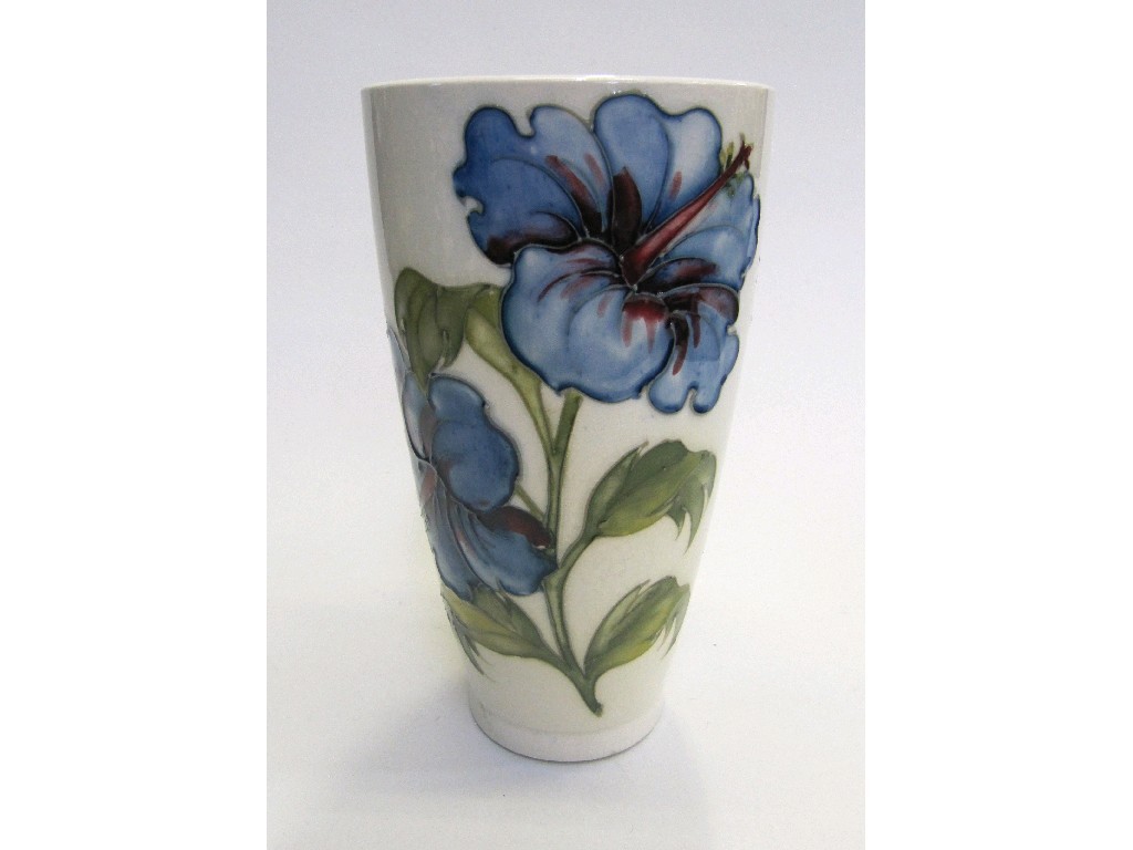 Appraisal: Moorcroft 'Hibiscus' vase on ivory ground with blue flowers