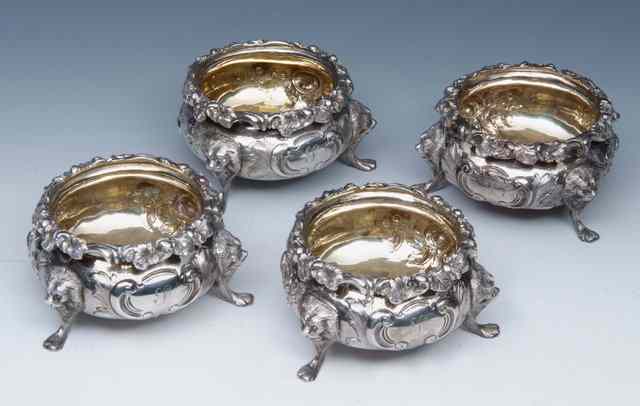 Appraisal: A SET OF FOUR VICTORIAN SILVER BUN SHAPED SALTS with